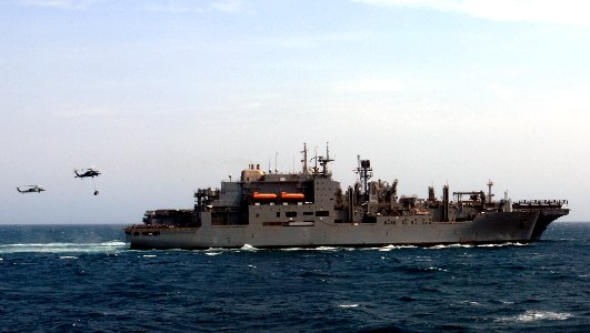 US Navy 110829-N-GH121-045 An MH-60S Sea Hawk helicopter assigned to the Dragon Whales of Helicopter Sea Combat Squadron (HSC) 28 picks up stores f