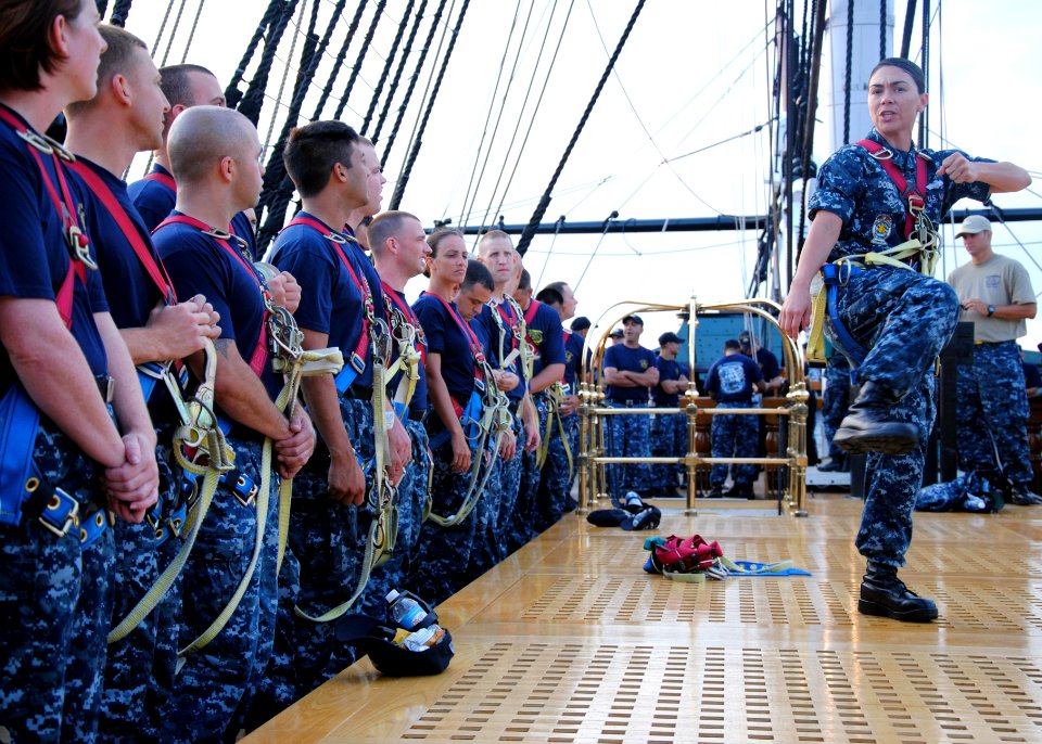 US Navy 110825-N-AU127-171 Yeoman 1st Class Chrishinda Dobbs, assigned to USS Constitution, trains chief selects to climb aloft