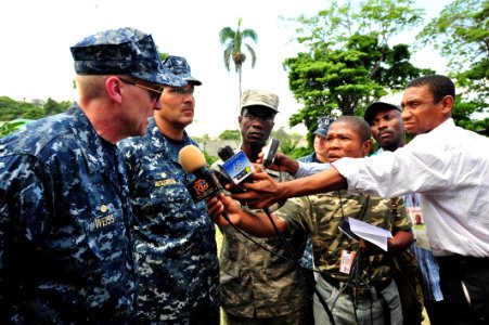 US Navy 110826-F-NJ219-128 Capt. David Weiss and Commodore Brian Nickerson answer questions for local media after the closing ceremony for Continui photo