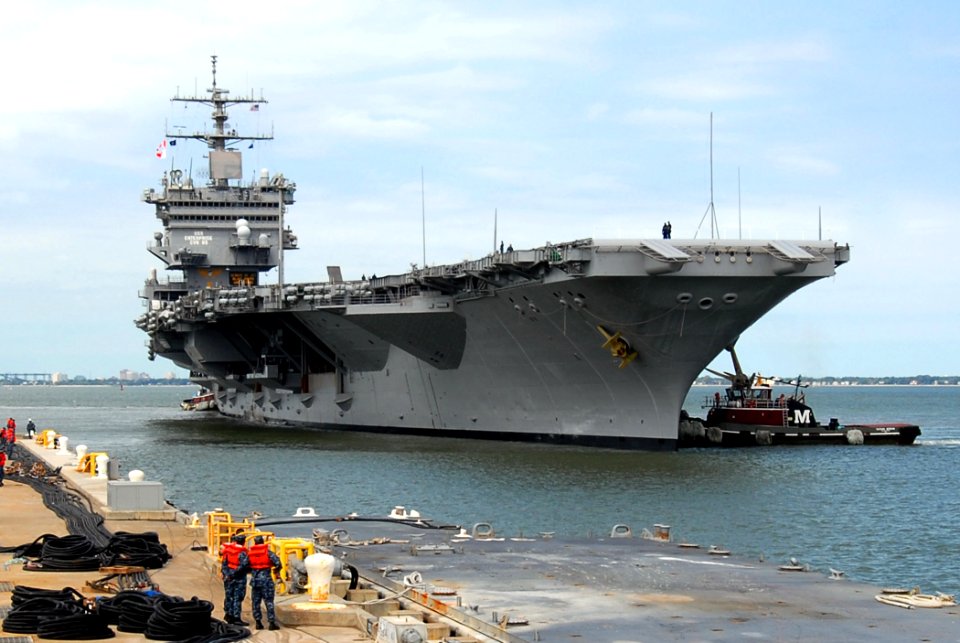 US Navy 110830-N-PS473-018 The aircraft carrier USS Enterprise (CVN 65) returns to Naval Station Norfolk after taking shelter at Norfolk Naval Ship