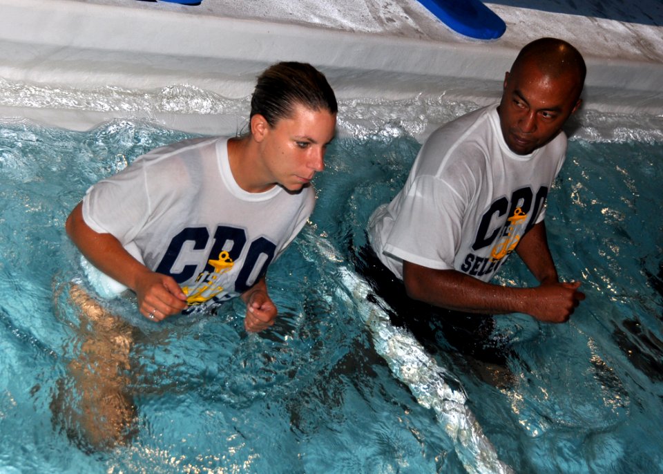 US Navy 110826-N-OH262-067 Chief (select) Operations Specialist Amy Zagorski and Chief (select) Machinist's Mate Cleveland Freeman perforce exercis
