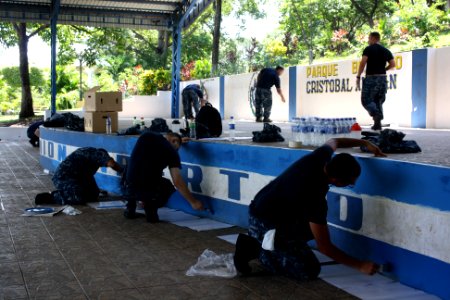 US Navy 110831-N-ZI300-064 Sailors assigned to the guided-missile frigate USS Thach (FFG 43) paint the stage and pavilion at the Cristobal Aleman B