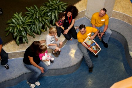 US Navy 110829-N-NT881-063 Sailors assigned to the Navy Operational Support Center read to children at Ronald McDonald House during a Cincinnati Na
