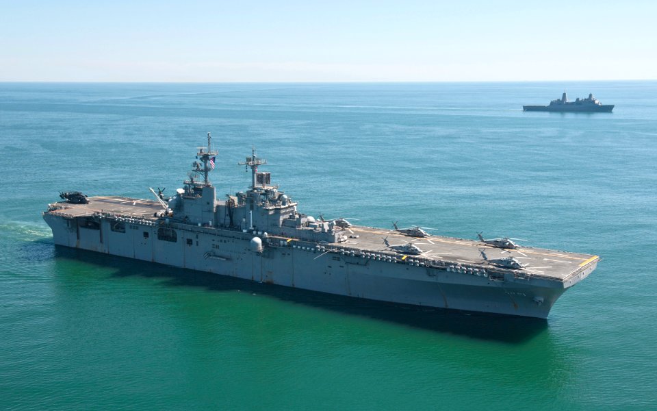US Navy 110831-N-PM781-002 USS Wasp (LHD 1) and USS San Antonio (LPD 17) transit in formation during a training exercise