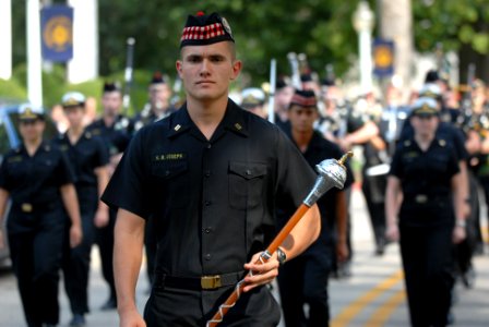 US Navy 110829-N-OA833-004 Members of the U.S. Naval Academy's Pipe and Drums march through the school's campus as they participate in a practice p
