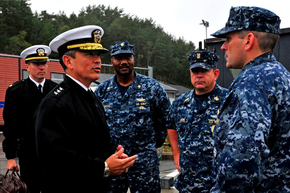 US Navy 110830-N-IZ292-009 Vice Adm. Harry B. Harris Jr., commander of U.S. 6th Fleet, meets with Cmdr. Tom Winter, right, commanding officer of th