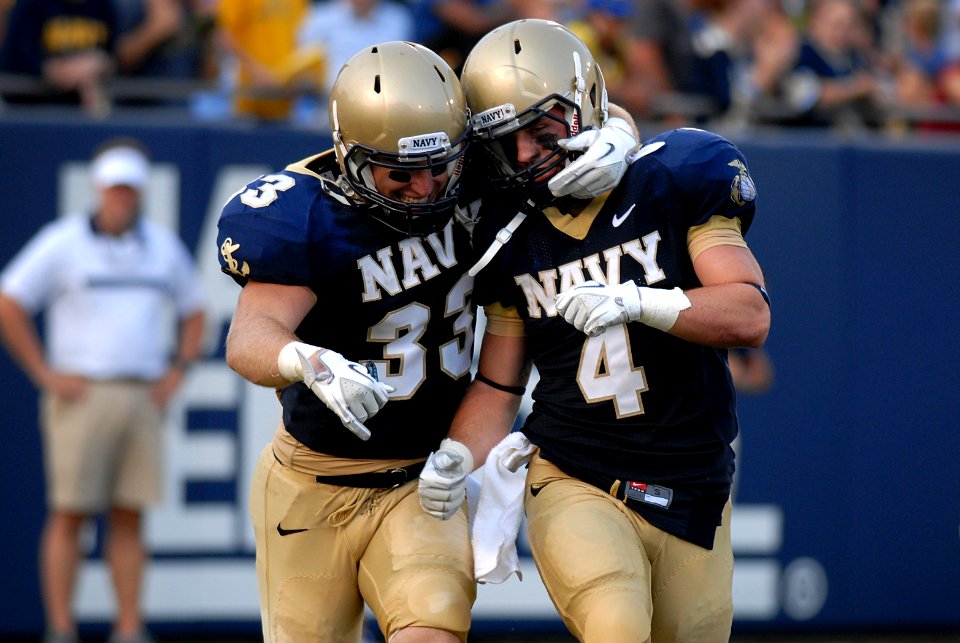 US Navy 110903-N-OA833-005 U.S. Naval Academy slotbacks John Howell (^33) and Bo Snelson (^4) celebrate after a touchdown