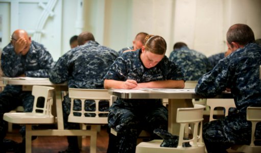 US Navy 110901-N-PB383-067 Sailors assigned to the amphibious transport dock ship USS New Orleans (LPD 18) take the Navy-wide E-6 advancement exam photo