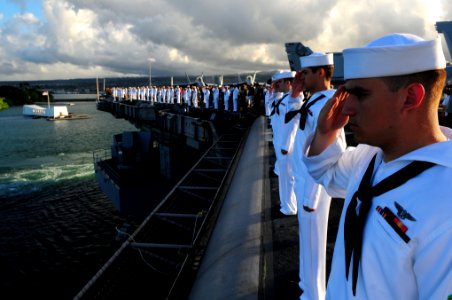 US Navy 110903-N-UO379-257 Sailors and Marines render honors as USS Ronald Reagan (CVN 76) passes the USS Arizona Memorial while departing Pearl H