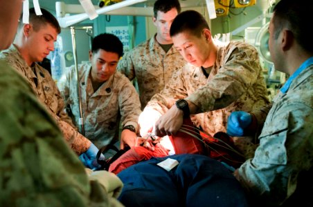 US Navy 110903-N-PB383-108 Hospital Corpsmen conduct medical triage training on a simulated patient aboard the amphibious transport dock ship USS N