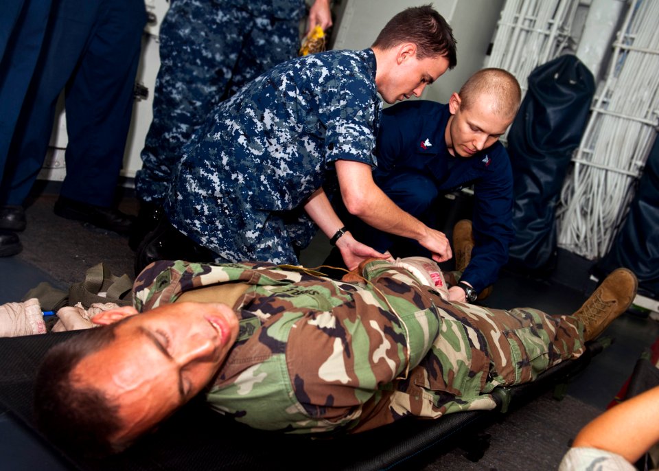 US Navy 110830-N-ZZ999-041 Sailors participate in a mass casualty training exercise aboard USS Wasp (LHD 1)