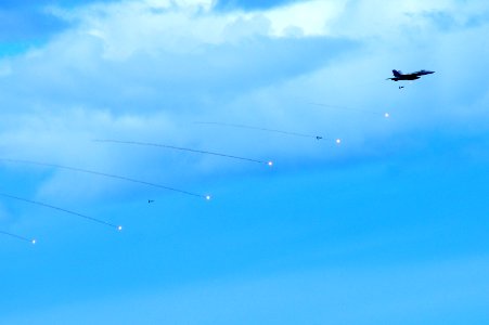 US Navy 110904-N-UO379-132 An F-A-18C Hornet releases training ordnance near USS Ronald Reagan (CVN 76) during a tiger cruise
