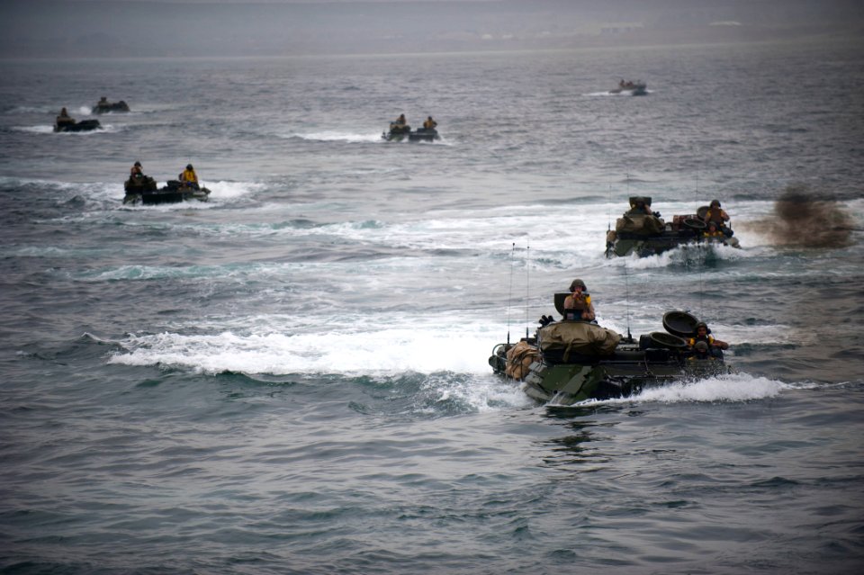 US Navy 110905-N-PB383-964 Amphibious assault vehicles (AAV) enter the well deck of the amphibious transport dock ship USS New Orleans (LPD 18)