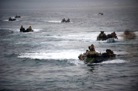 US Navy 110905-N-PB383-964 Amphibious assault vehicles (AAV) enter the well deck of the amphibious transport dock ship USS New Orleans (LPD 18)