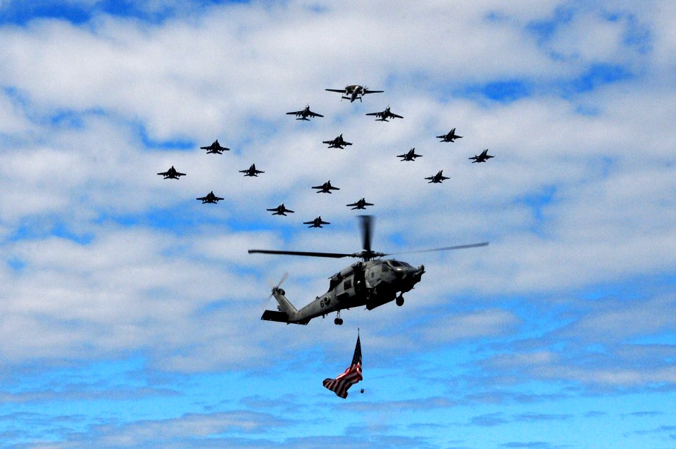 US Navy 110905-N-UO379-765 Aircraft assigned to Carrier Air Wing (CVW) 14 fly over the aircraft carrier USS Ronald Reagan (CVN 76) during a tiger c