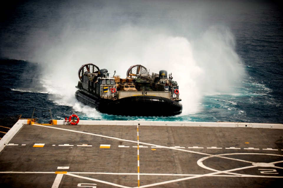 US Navy 110904-N-PB383-361 A landing craft air cushion (LCAC) approaches the amphibious transport dock ship USS New Orleans (LPD 18)