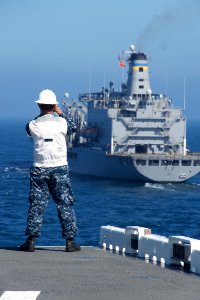 US Navy 110906-N-ZC343-843 A Sailor monitors the approach alongside the Military Sealift Command fleet replenishment oiler USS Yukon (T-AO 202)