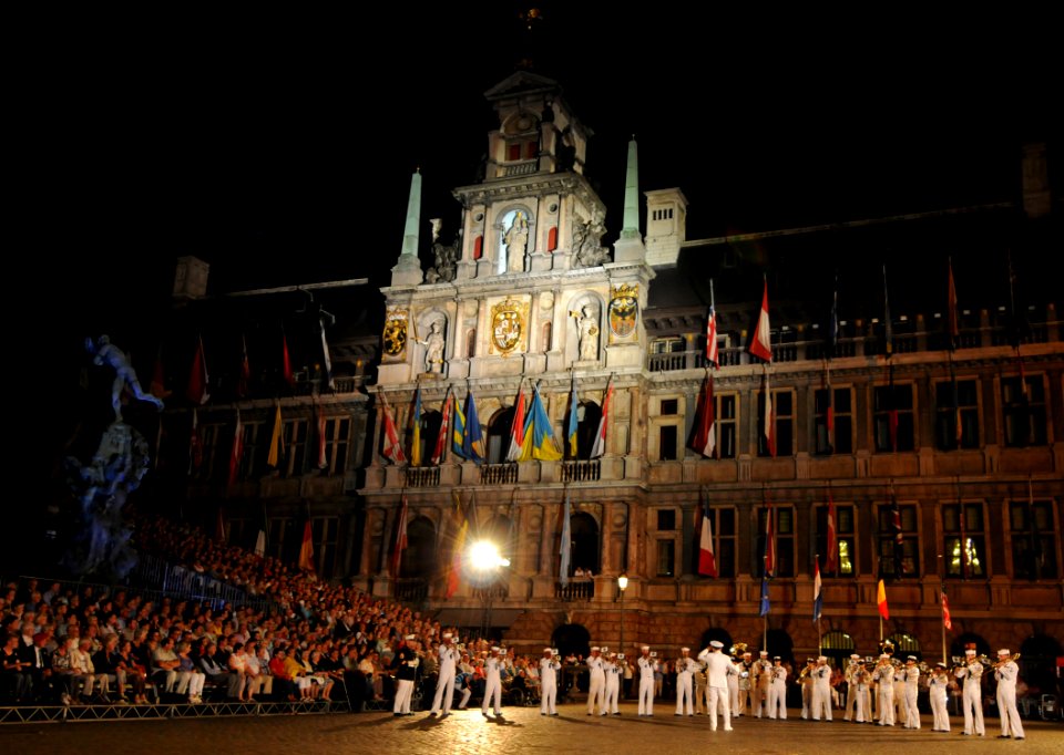 US Navy 110903-N-AQ172-546 Musicians assigned to Commander, U.S. Naval Forces Europe Band perform a military tattoo following a parade through the