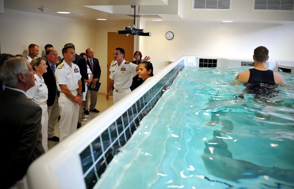 US Navy 110907-N-AW702-078 Capt. Lynn Welling, commanding officer of Naval Hospital Jacksonville, gives a tour of the new aquatic treadmill