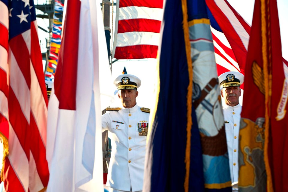 US Navy 110907-N-CZ945-058 Vice Adm. Scott R. Van Buskirk, center, and Vice Adm. Scott H. Swift salute as the color guard parades the colors at the