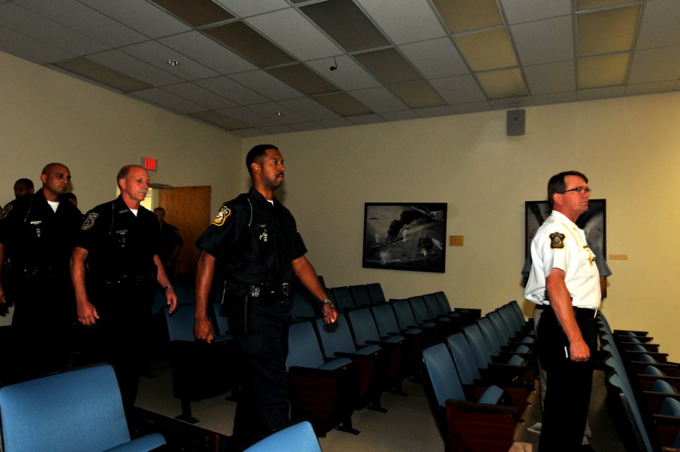 US Navy 110902-N-NL541-003 Cadet Brian Washington, center, graduates from Commander, Navy Region Mid-Atlantic Regional Training Academy at Joint Ex