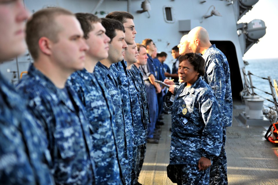 US Navy 110907-N-YZ751-003 Command Master Chief Paulette Brock conducts a uniform inspection aboard USS Truxtun (DDG 103)