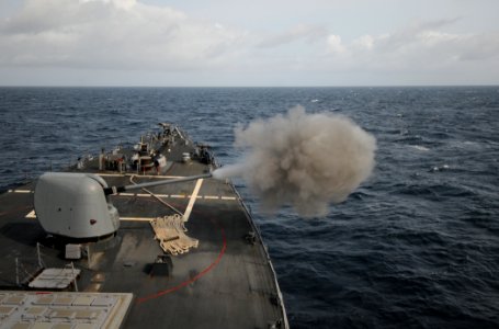 US Navy 110902-N-XQ375-076 The guided-missile destroyer USS Mitscher (DDG 57) fires its 5-inch, 54-caliber Mark 45 lightweight gun