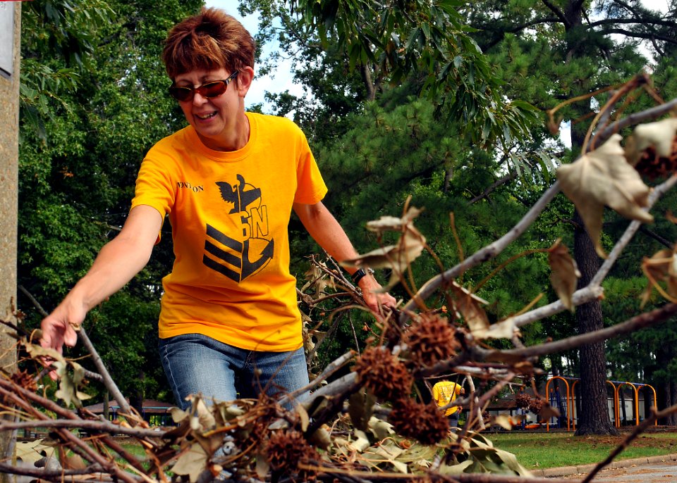 US Navy 110907-N-JP983-014 Chief petty officer select Teresa Montebon participates in a community service event to clean up debris from hurricane I