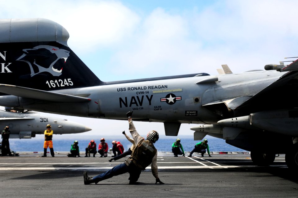 US Navy 110907-N-SB672-138 Shooters signal satisfactory final checks of an EA-6B Prowler before it departs USS Ronald Reagan (CVN 76) during the (C