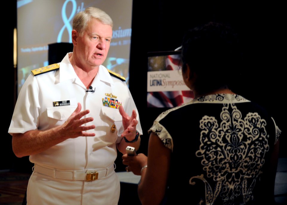 US Navy 110908-N-KV696-268 Chief of Naval Operations (CNO) Adm. Gary Roughead conducts an interview with a journalist from Latina Style magazine