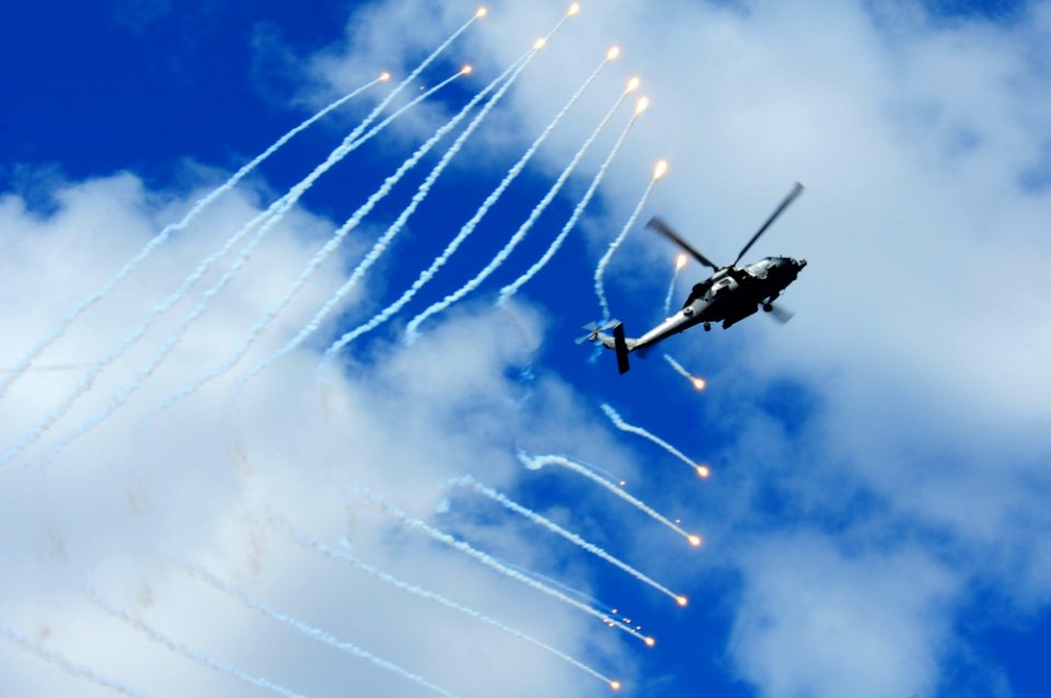US Navy 110904-N-UO379-165 An HH-60H Sea Hawk helicopter assigned to the Black Knights of Helicopter Anti-Submarine Squadron (HS) 4 releases counte