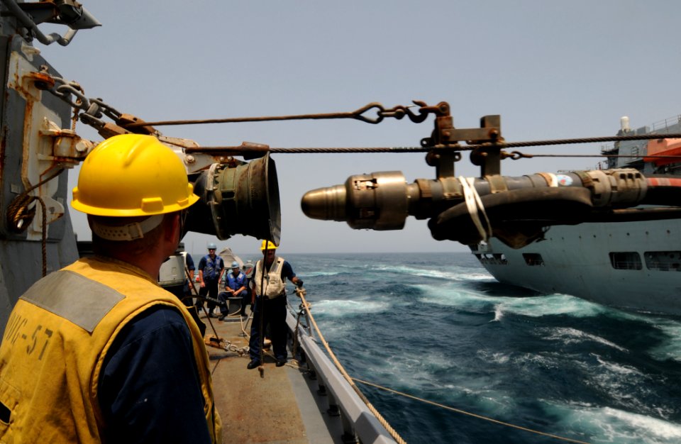 US Navy 110904-N-XQ375-297 Boatswain's Mate 3rd Class Jeff Rashley stands by as a probe from the Royal Navy fleet auxiliary fast fleet tanker RFA W