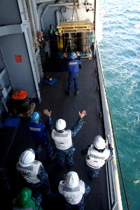 US Navy 110906-N-ZC343-010 Sailors receive a pallet of supplies during a replenishment at sea aboard the amphibious assault ship USS Bonhomme Richa