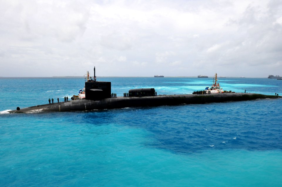 US Navy 110905-N-JH293-063 The Ohio-class guided-missile submarine USS Georgia (SSGN 729) prepares to moor outboard of the submarine tender USS Emo