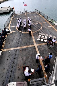 US Navy 110909-N-IZ292-170 Members of the Mauritius Police Force Coast Guard receive certificates during a graduation ceremony aboard USS Samuel B
