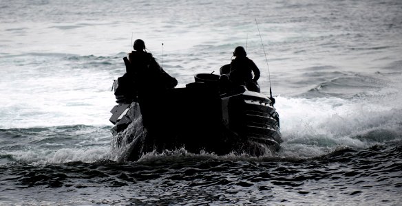 US Navy 110905-N-PB383-666 An amphibious assault vehicle (AAV) enters the well deck of the amphibious transport dock ship USS New Orleans (LPD 18)