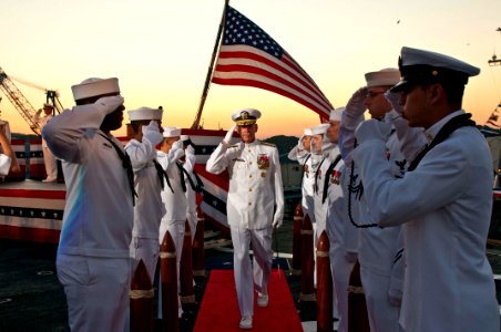 US Navy 110907-N-CZ945-341 Vice Adm. Scott H. Swift, commander of U.S. 7th Fleet, salutes the sideboys as he departs the U.S. 7th Fleet command shi photo