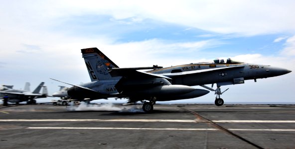 US Navy 110909-N-OY799-228 An F-A-18C Hornet assigned to the Warhawks of Strike Fighter Squadron (VFA) 97 lands aboard the Nimitz-class aircraft ca