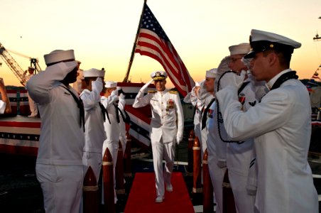 US Navy 110907-N-CZ945-333 Vice Adm. Scott R. Van Buskirk, outgoing commander of U.S. 7th Fleet, salutes the sideboys as he departs the U.S. 7th Fl photo