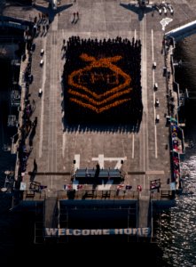 US Navy 110907-N-TU221-134 Chief petty officers and chief petty officer selects commemorate Chief Petty Officer Pride Day with a formation aboard