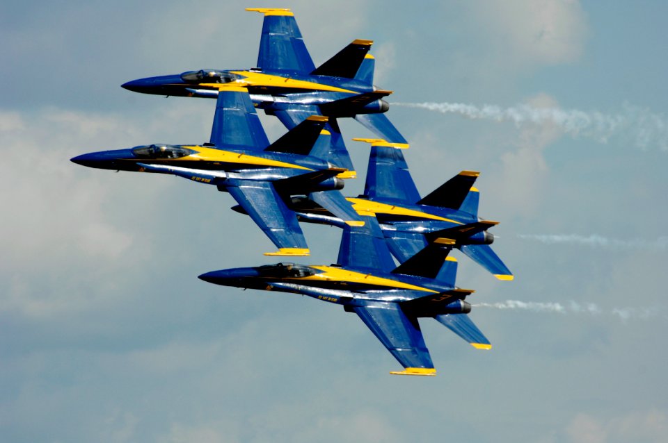 US Navy 110909-N-IR859-002 The U.S. Navy flight demonstration squadron, the Blue Angels, perform the Diamond 360 maneuver at the Guardians of Freed