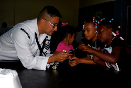 US Navy 110908-N-CI293-106 Electronics Technician 1st Class Alex Aligaen, left, a reserve component Sailor assigned to U.S. Strategic Command