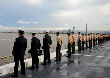 US Navy 110908-N-PR310-016 Sailors and New York firefighters man the rails aboard the amphibious transport dock ship USS New York (LPD 21)