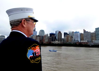 US Navy 110908-N-PR310-002 New York Fire Department Chief Jack Prichard prepares to present honors as they pass the World Trade Center