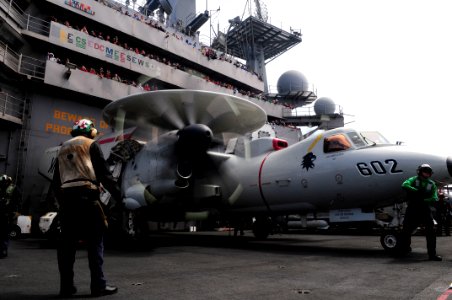 US Navy 110907-N-SB672-291 Friends and family of Sailors and Marines assigned to the aircraft carrier USS Ronald Reagan (CVN 76) watch the Carrier photo