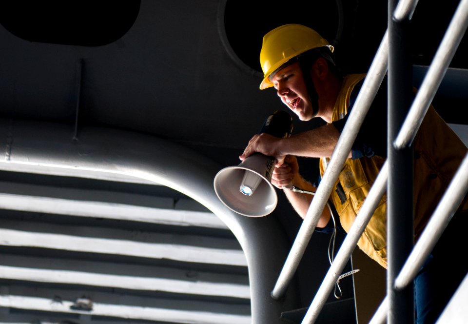 US Navy 110913-N-TZ605-043 Boatswain's Mate 2nd Class Christopher Cook, assigned to the deck department's 3rd Division