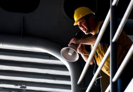US Navy 110913-N-TZ605-043 Boatswain's Mate 2nd Class Christopher Cook, assigned to the deck department's 3rd Division