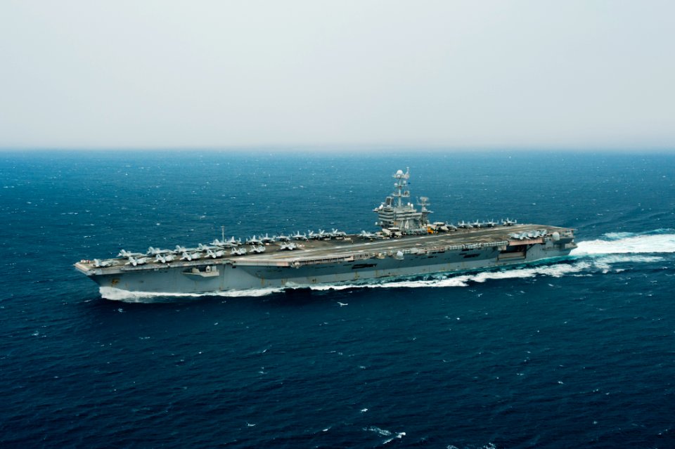 US Navy 110909-N-BT887-171 The Nimitz-class aircraft carrier USS John C. Stennis (CVN 74) transits the Strait of Malacca after leaving Port Klang,