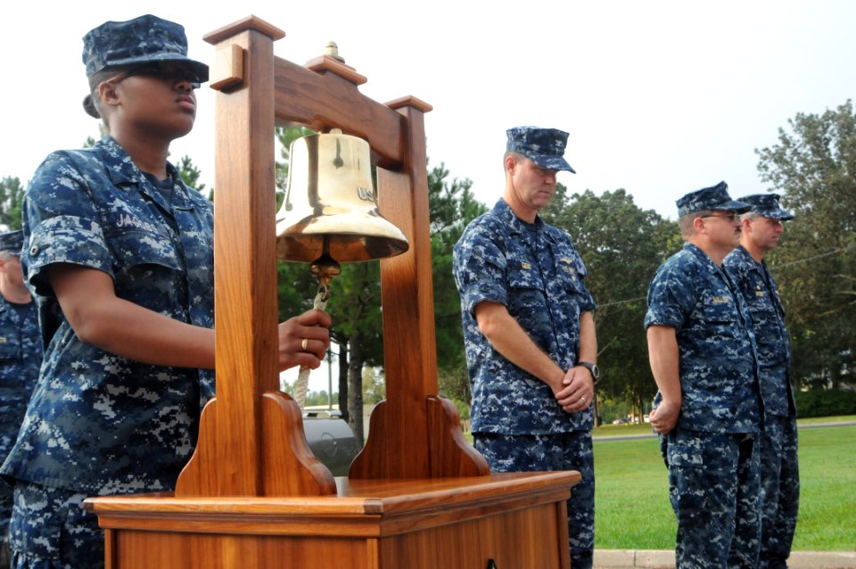 US Navy 110909-N-GZ984-038 Religious Programs Specialist Seaman Sha'Quanda Jacobs rings the bell during commemoration ceremony of the Sept. 11, 200