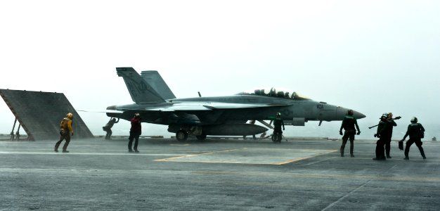 US Navy 110912-N-BT887-336 Sailors aboard the Nimitz-class aircraft carrier USS John C. Stennis (CVN 74) prepare to launch an F-A-18F Super Hornet